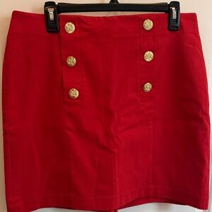 Elegant Red Buttoned Skort gold button feature and lots of stretch